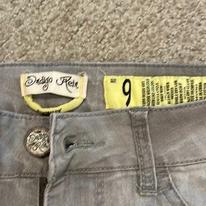 Grey skinny pants, stretchy. Only worn a few times.